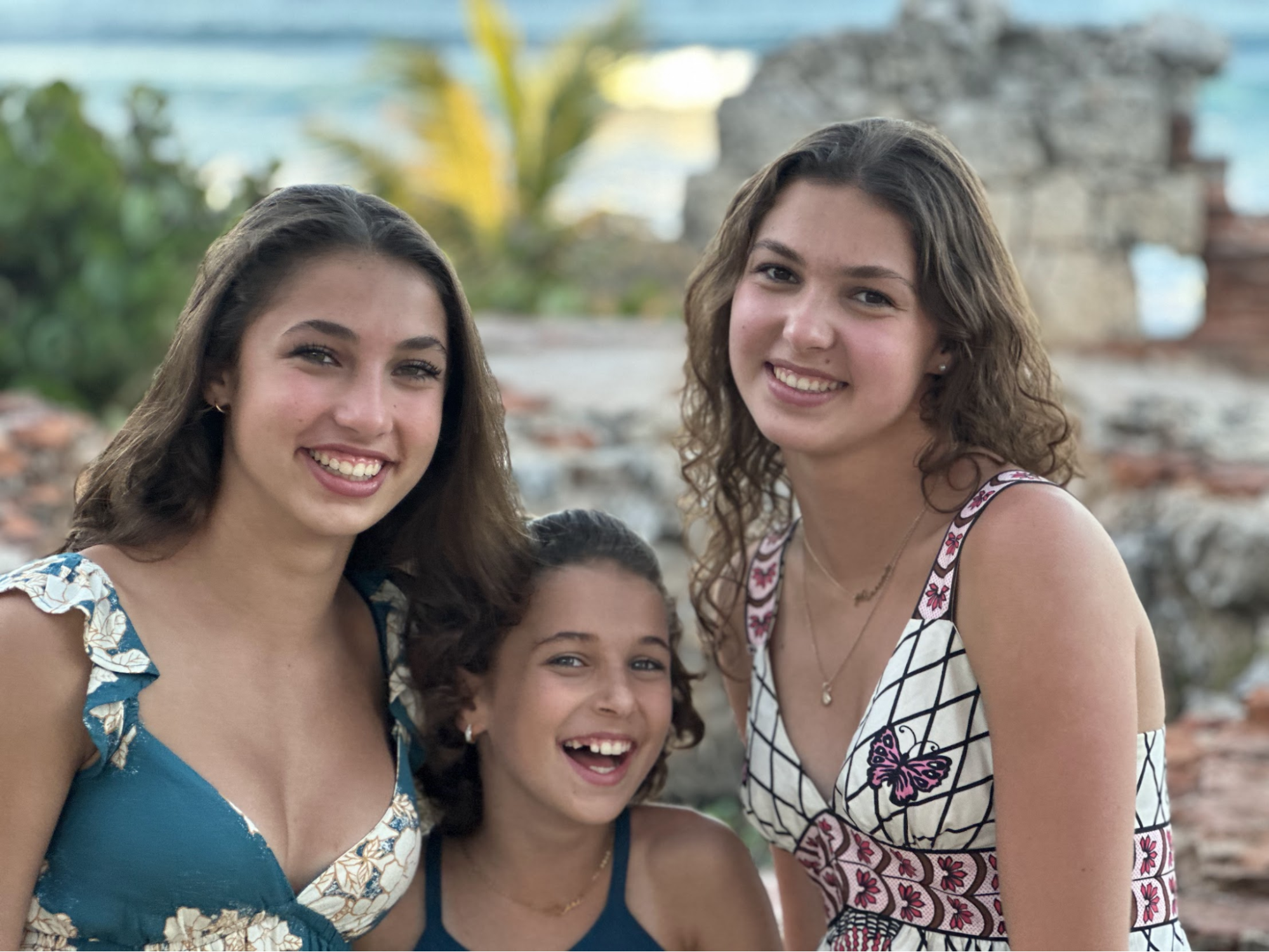 Three sisters laughing