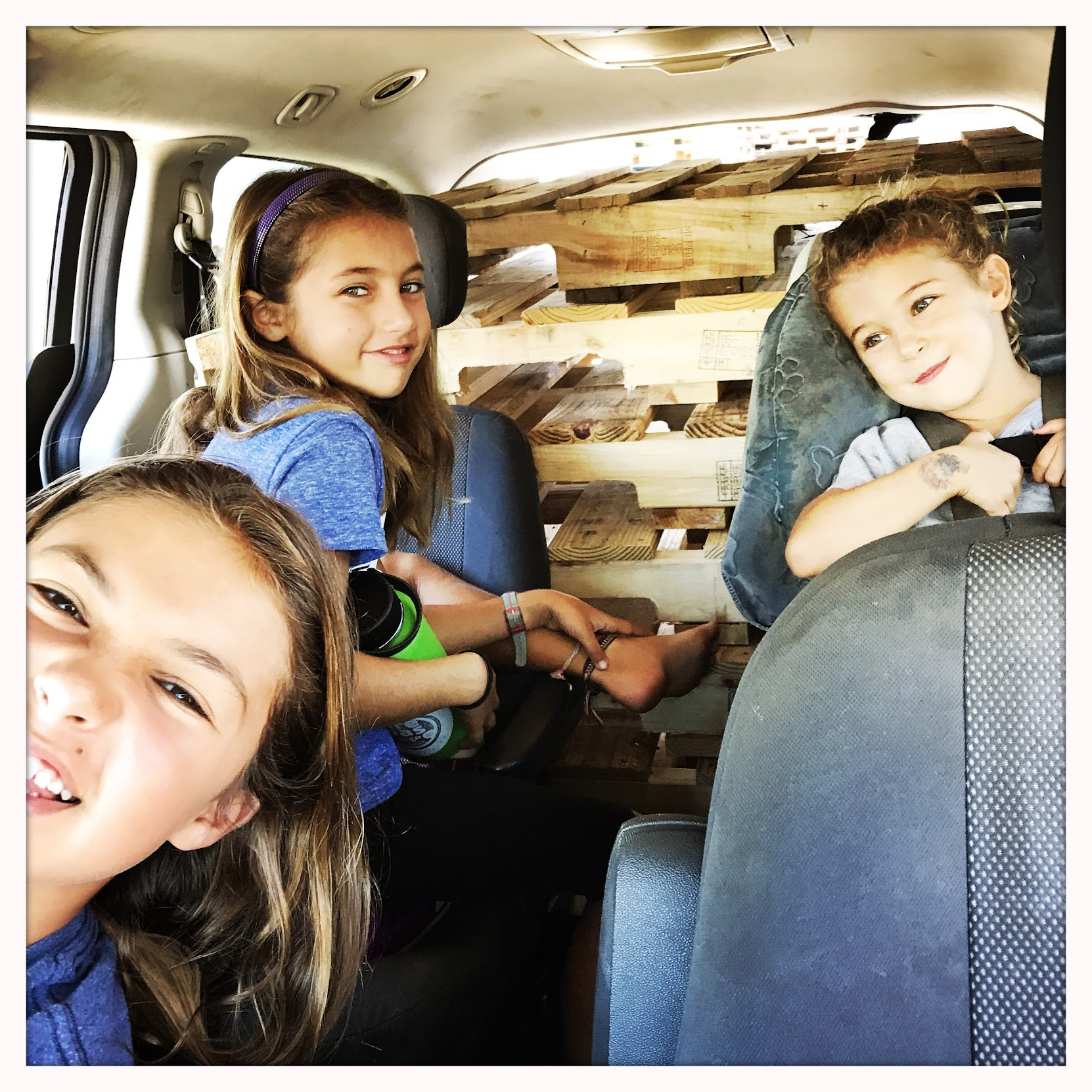 18 - Three sisters transporting pallets